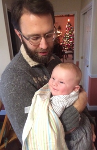 'No hard feelings'... Francis bonds with his uncle, Fr. Chris, after the sacramental dousing